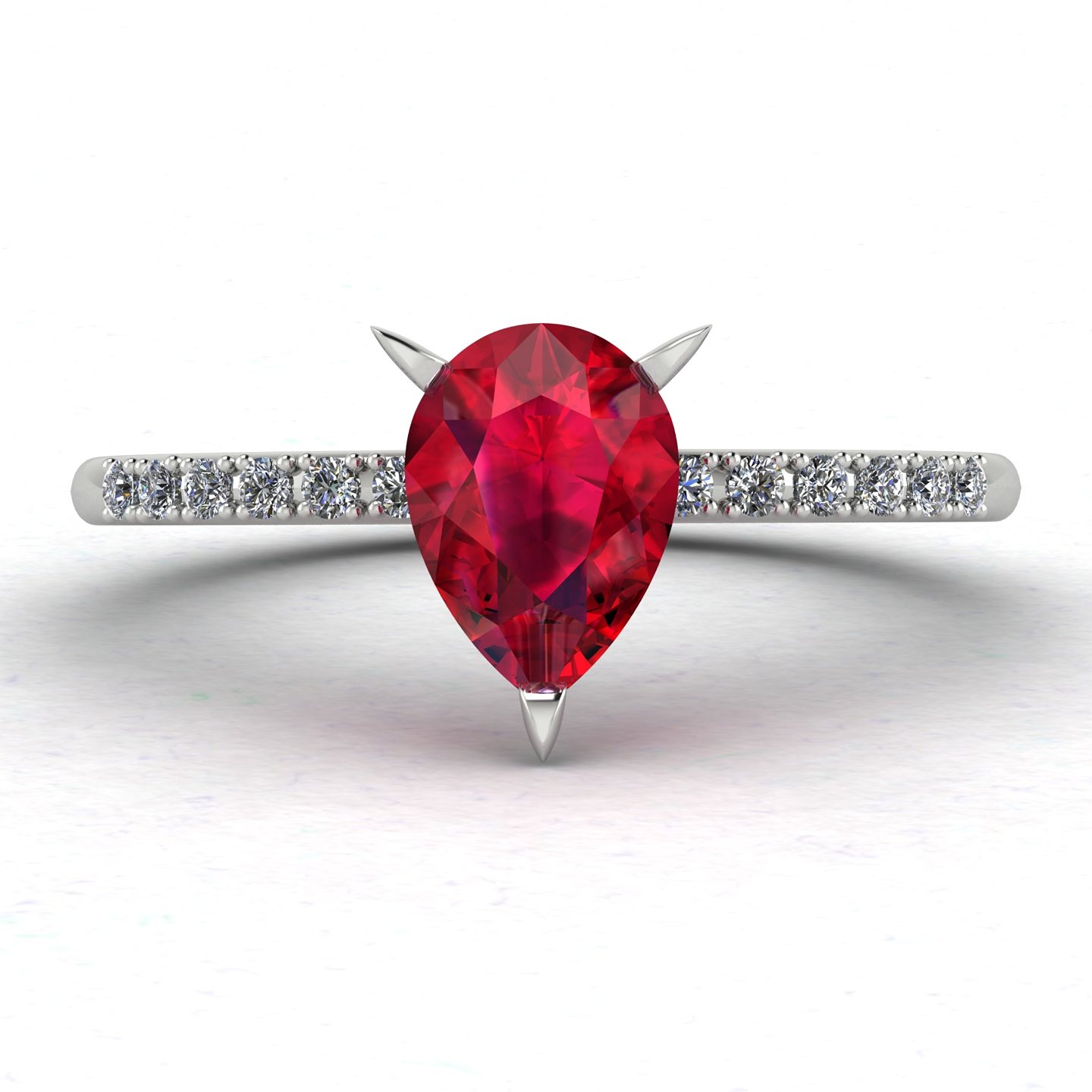Pear shaped spiky set ruby and diamonds engagement ring