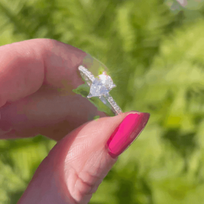 Calista: Pear Shaped Diamond & Diamonds White Gold or Platinum Ring