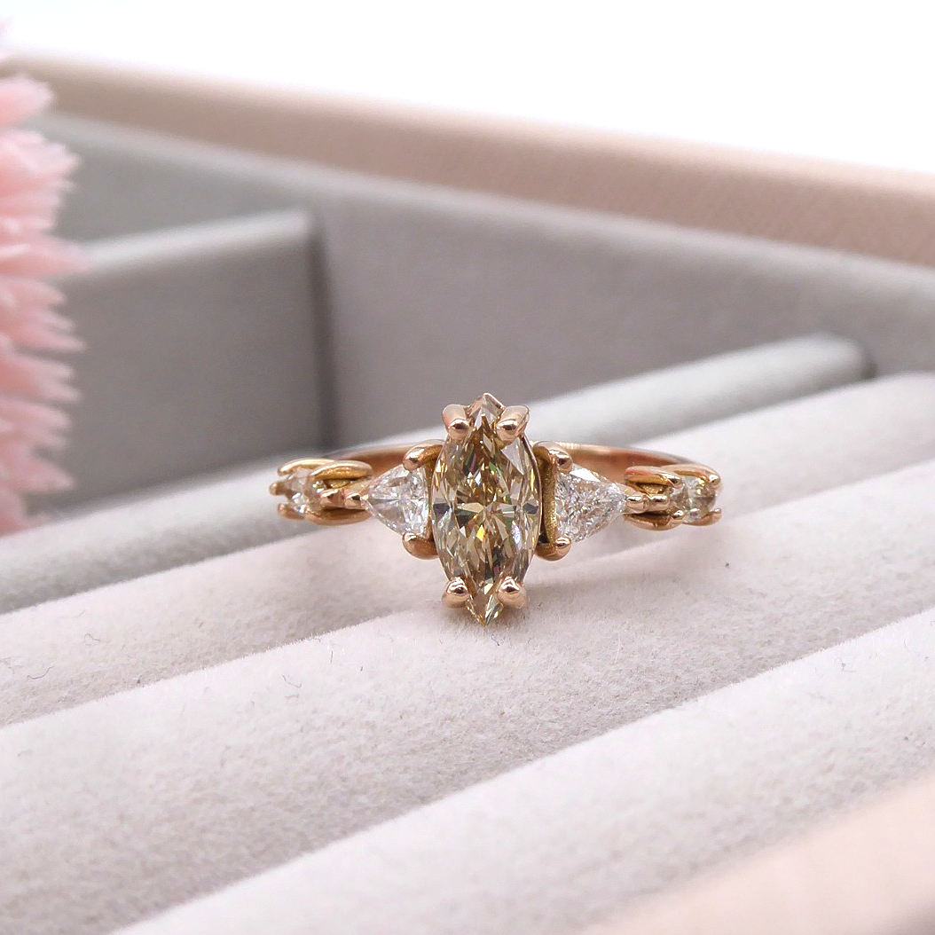 Marquise shaped champagne diamond set in rose gold engagement ring