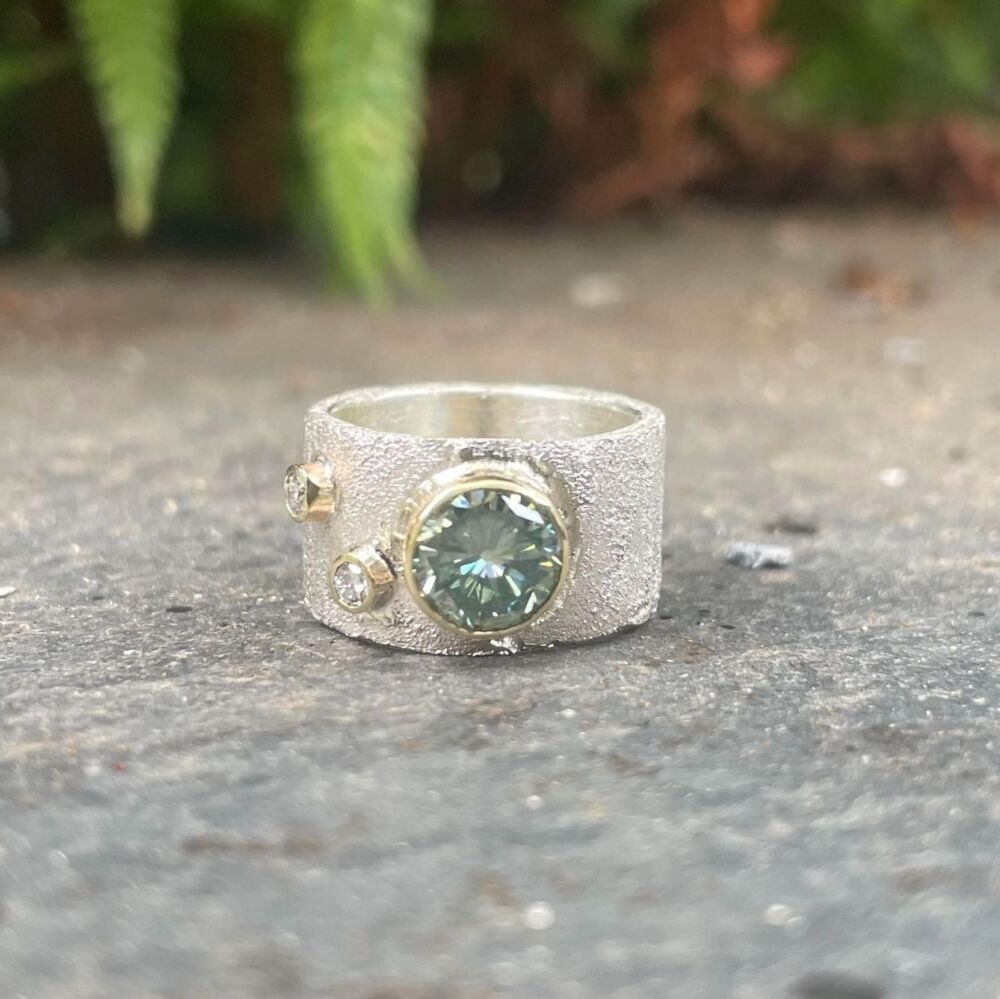 Moissanite and Diamond Textured Silver Ring With Gold Detail
