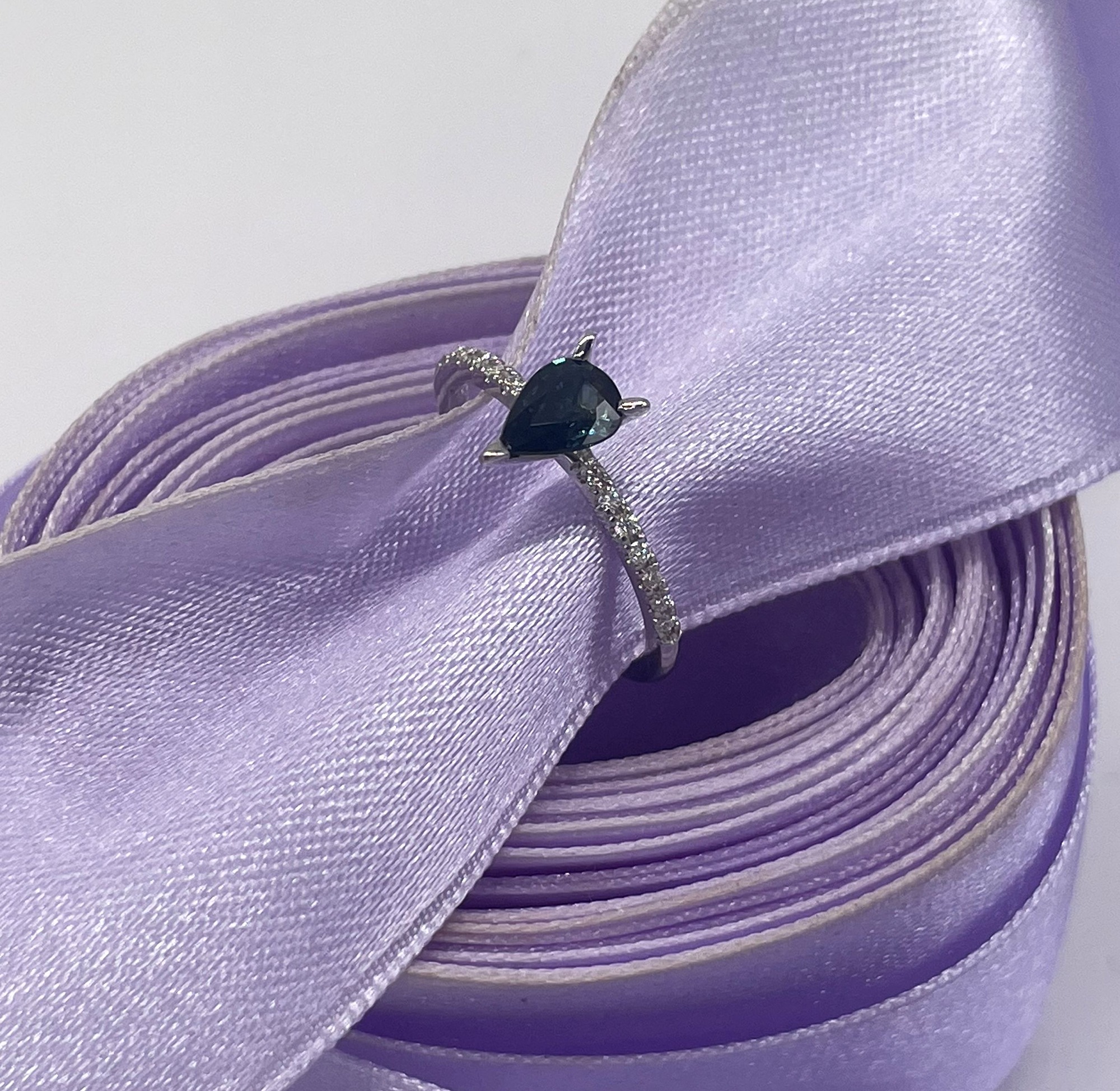 Calista gothic style pear shaped teal sapphire engagement ring.