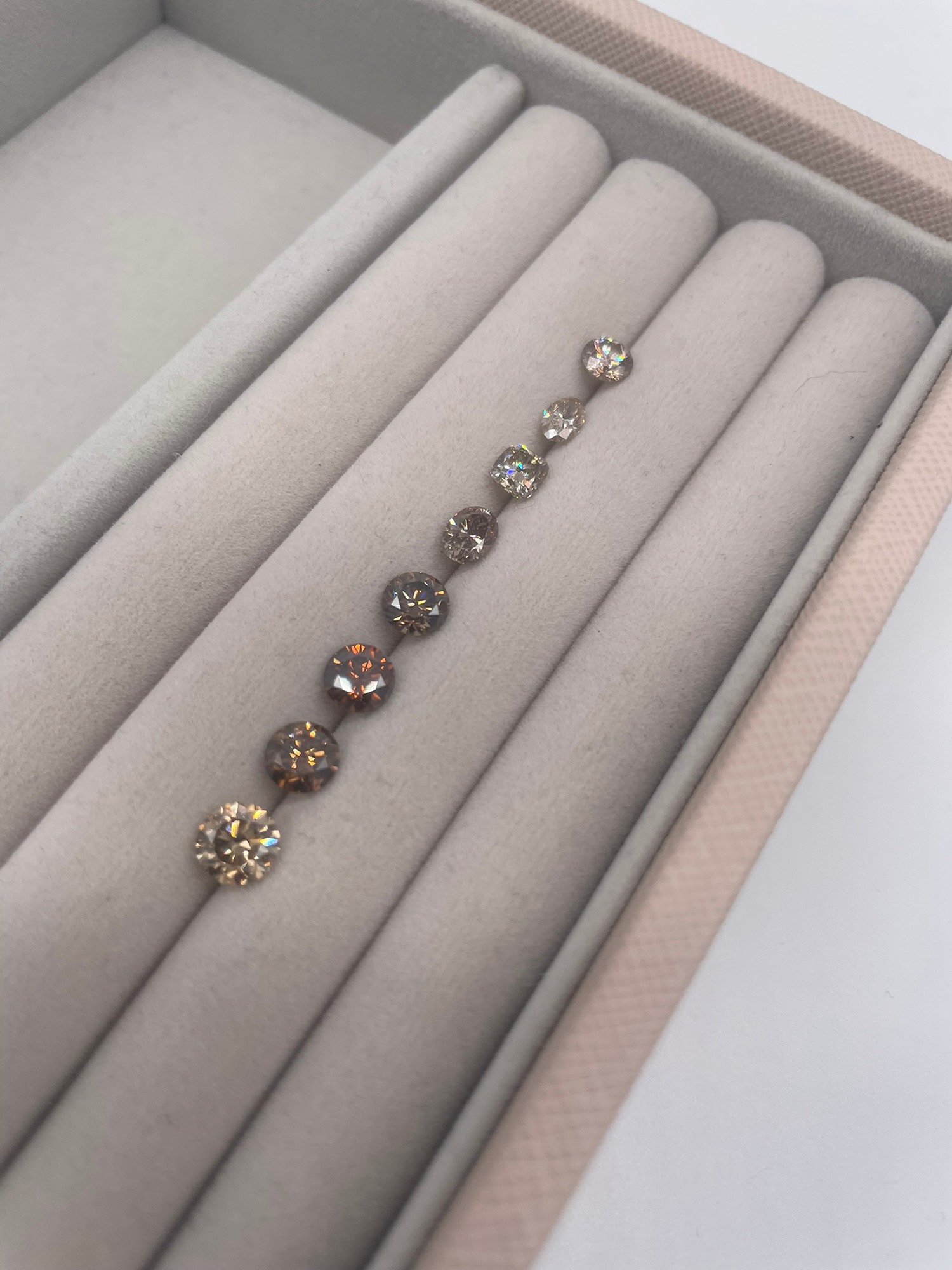 loose cognac and champagne diamonds for a bespoke jewellery.