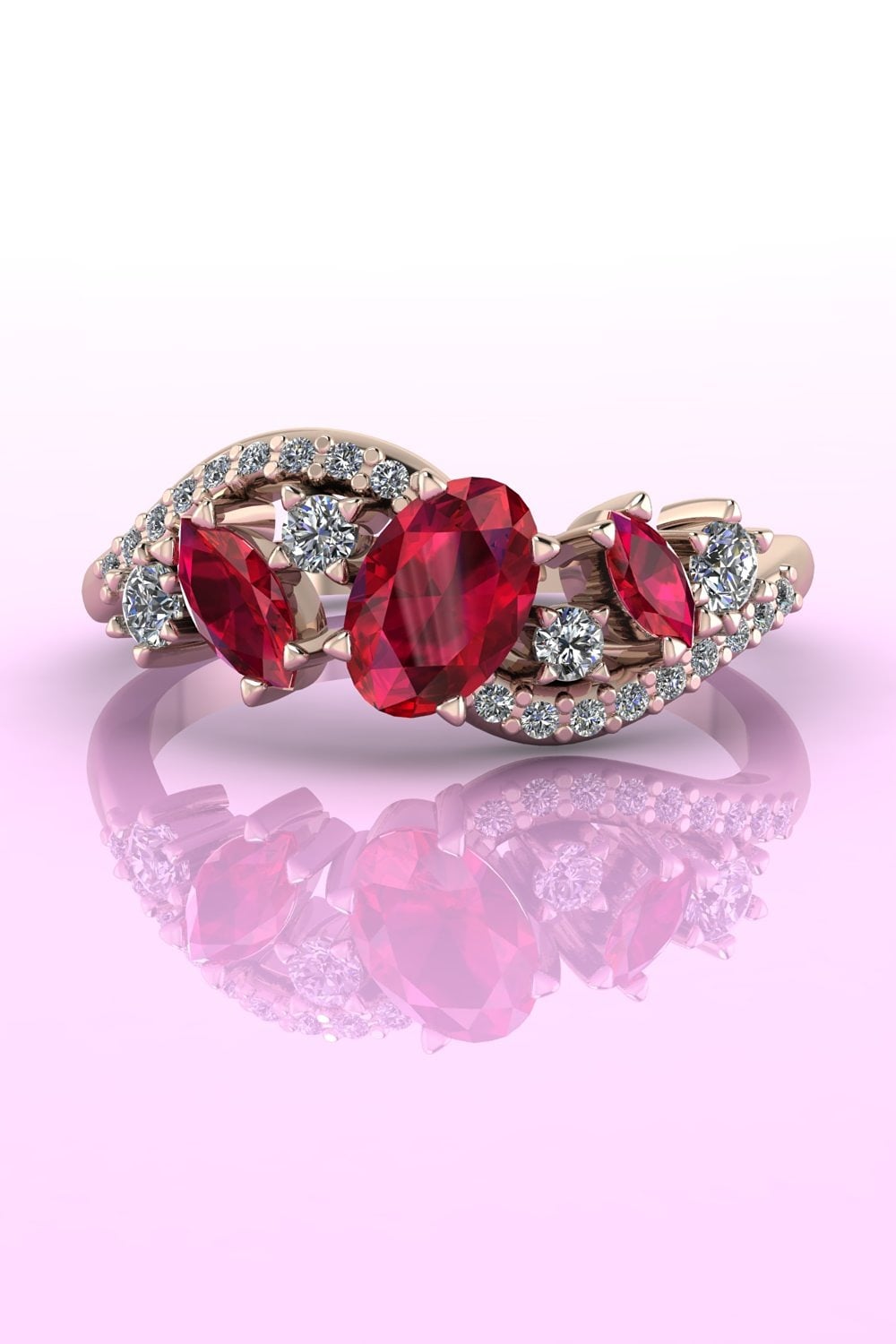 The Atlantis Storm dramatic ruby and diamond wave engagement ring in 18ct rose gold.