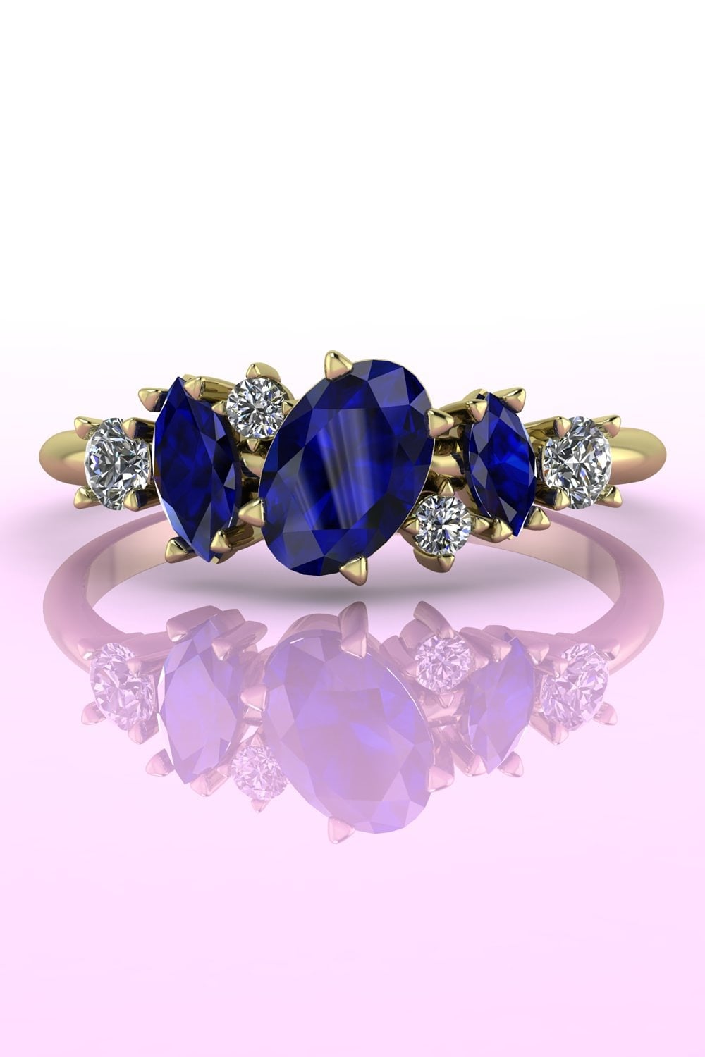 The Atlantis Paradise sapphire and diamond asymmetrical cluster ring in 18ct yellow gold.