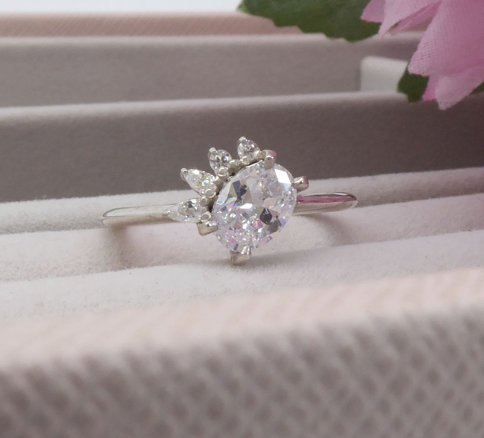 Quirky, unusual asymmetrical diamond engagement ring