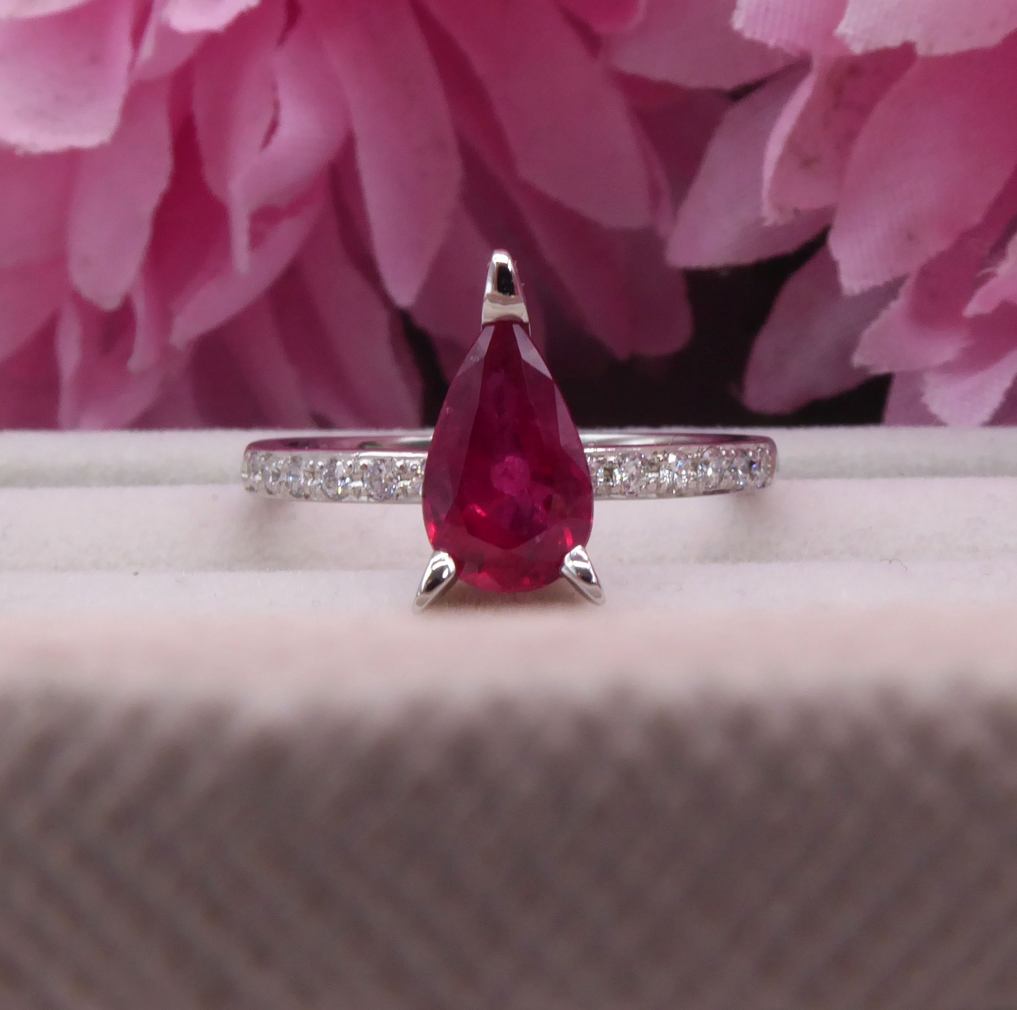 A bespoke ruby Calista engagement ring