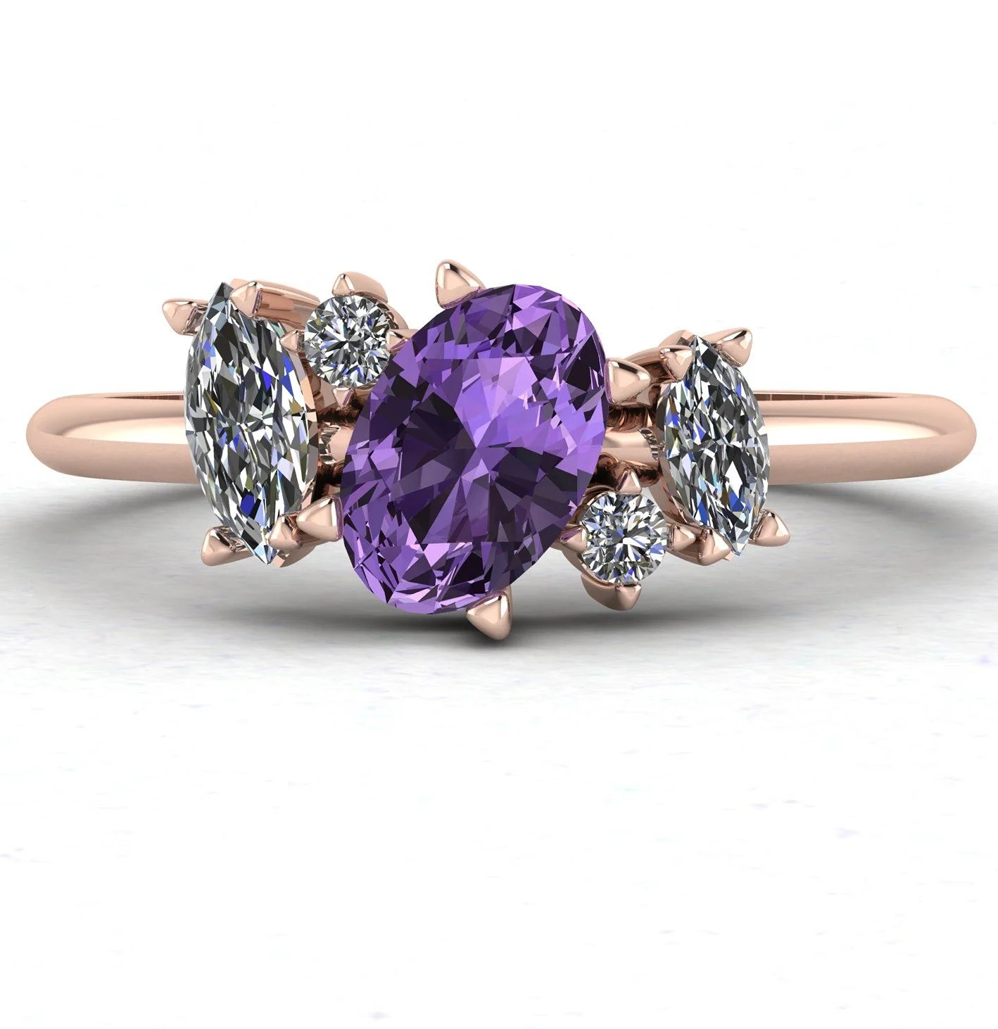 Rare violet sapphire engagement ring in a modern handmade gold setting.