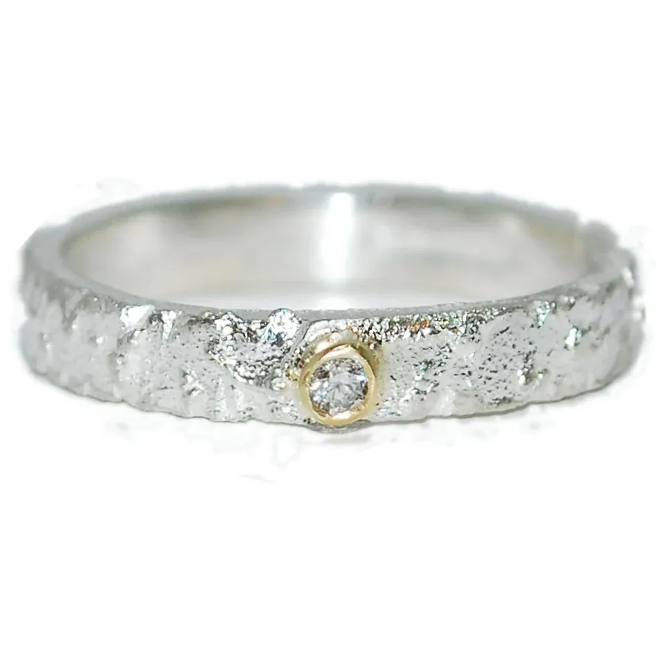 Mixed metal engagement ring handcrafted in yellow gold and platinum.