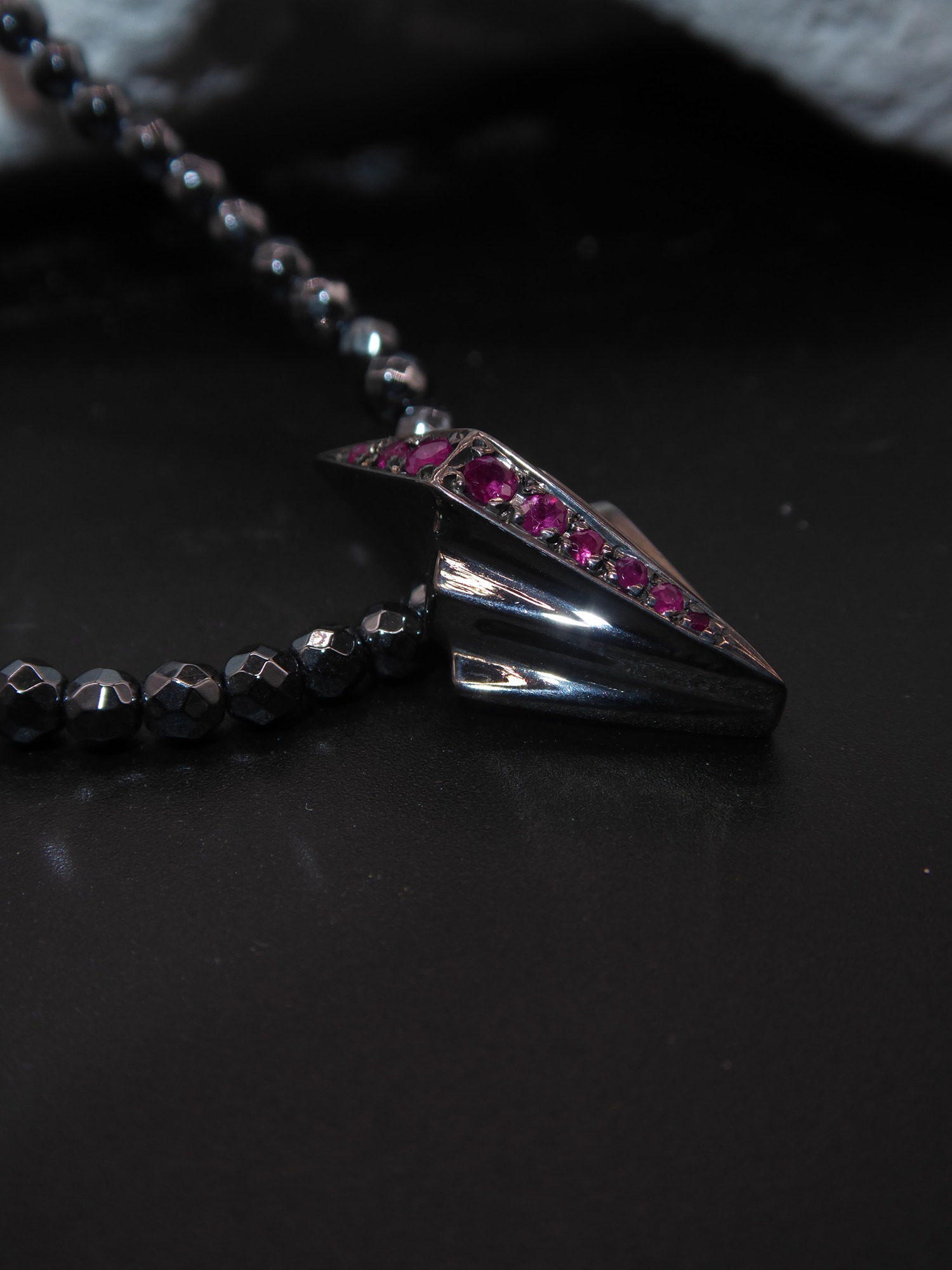 Unique gemstone necklaces featuring semi-precious stones and vibrant crystals set in artisan silver.
