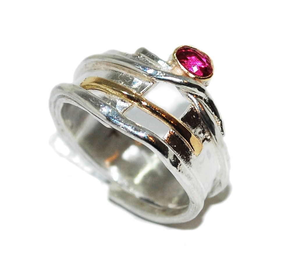 Silver Ring with an Oval Rubelite set in Gold