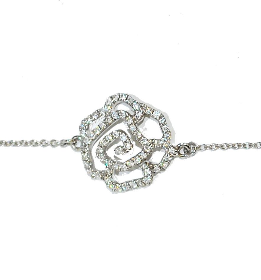 Dainty diamond flower bracelet set in 18 carat white gold.