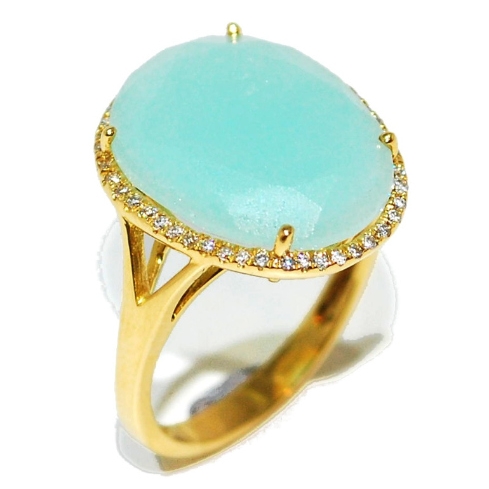 Blue gemstone with diamonds, yellow gold cocktail ring