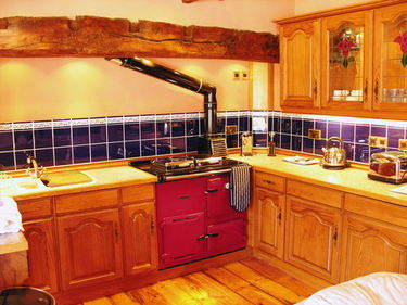 Cottage Kitchen with oil fired Rayburn