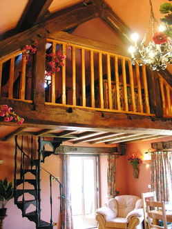 Cottage Spiral stairs to gallery