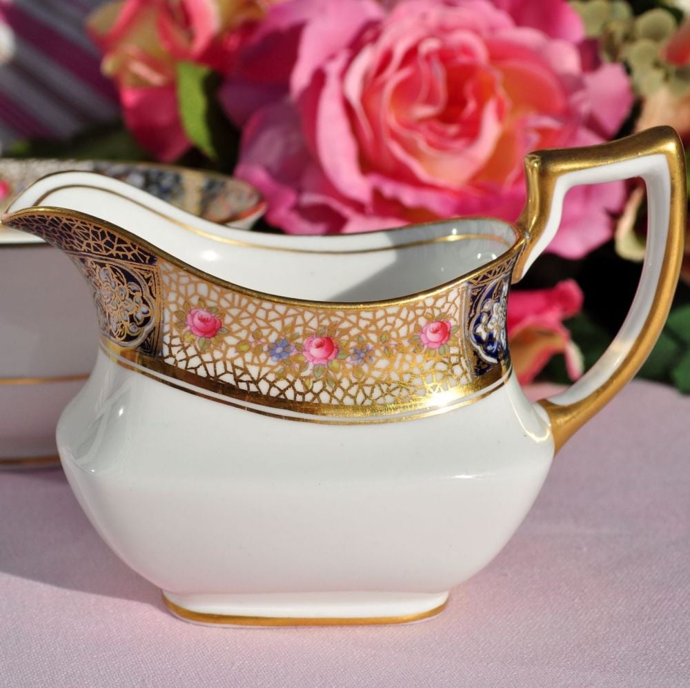 Elegant shaped creamer or milk jug