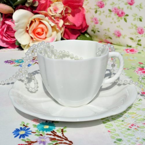 Royal Crown Derby White Glazed China Teacup and Saucer c.1942
