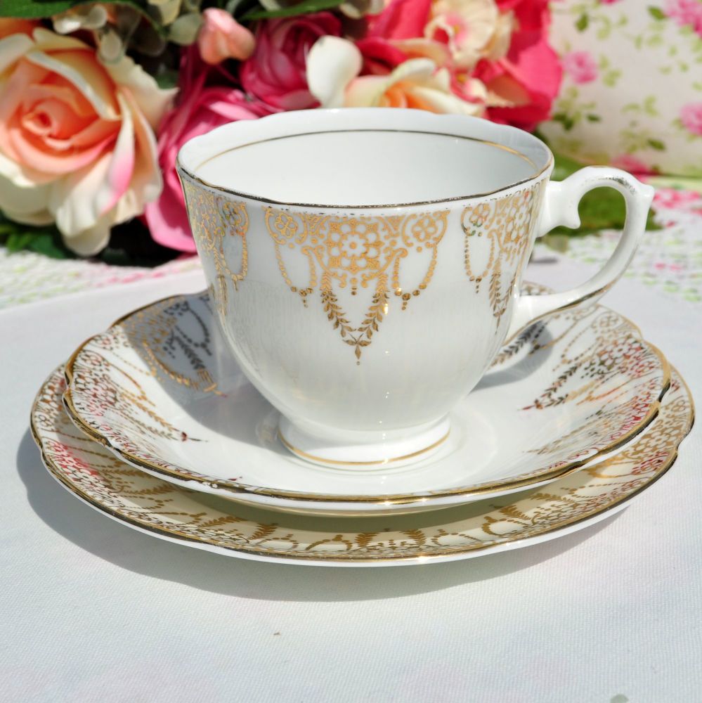 Royal Stuart Classical Gold Border Teacup Trio c.1950s