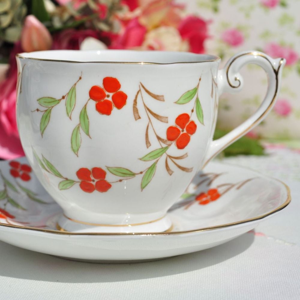 Queen Anne Orange Floral Teacup and Saucer c.1950s