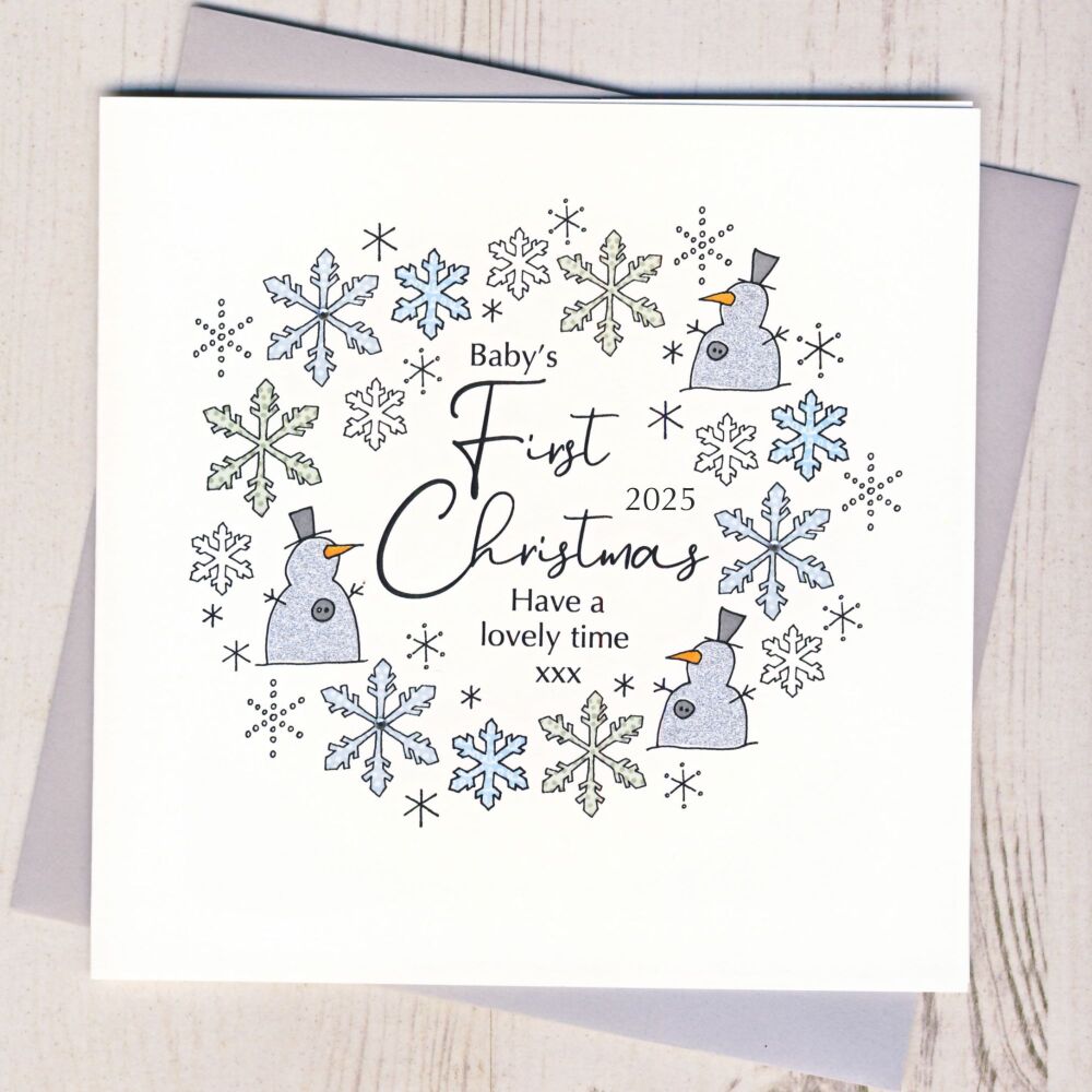 <!-- 013-->Baby's First Christmas Card