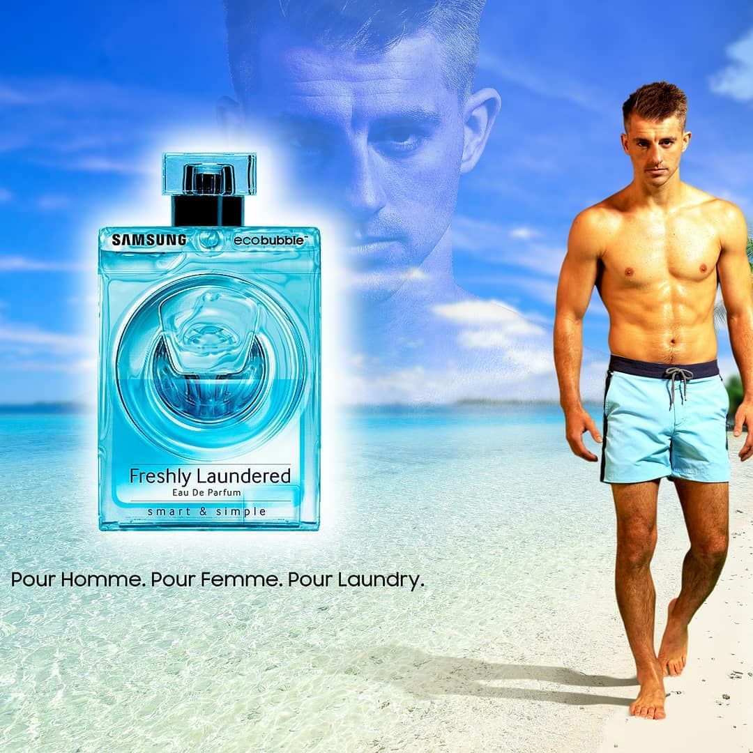 Gymnast Max Whitlock, shirtless on a beach next to a bottle of Freshly Laundered perfume, a project for Samsung