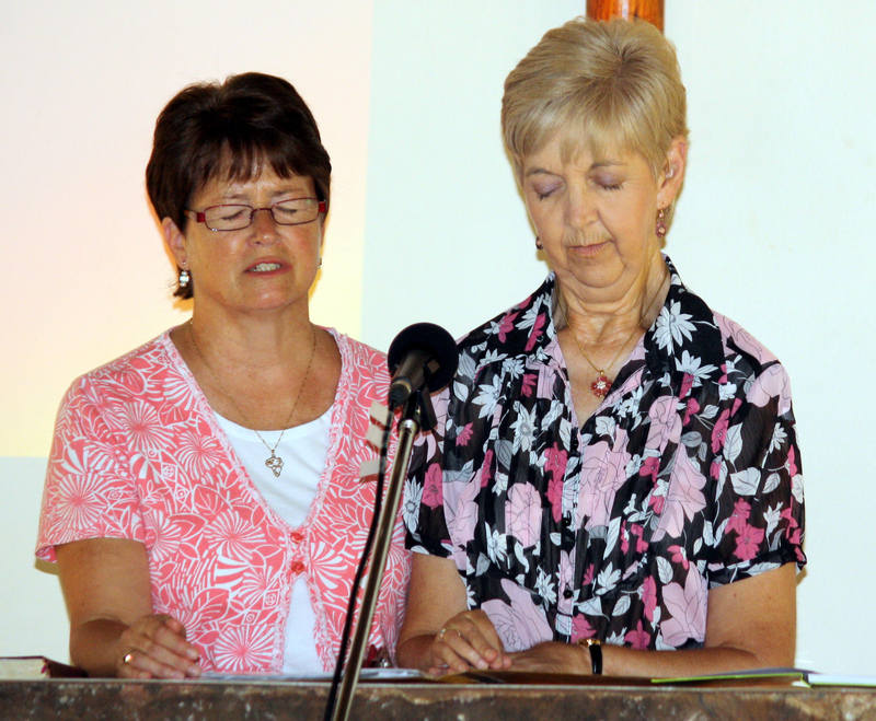 Jan and Mintie in prayer