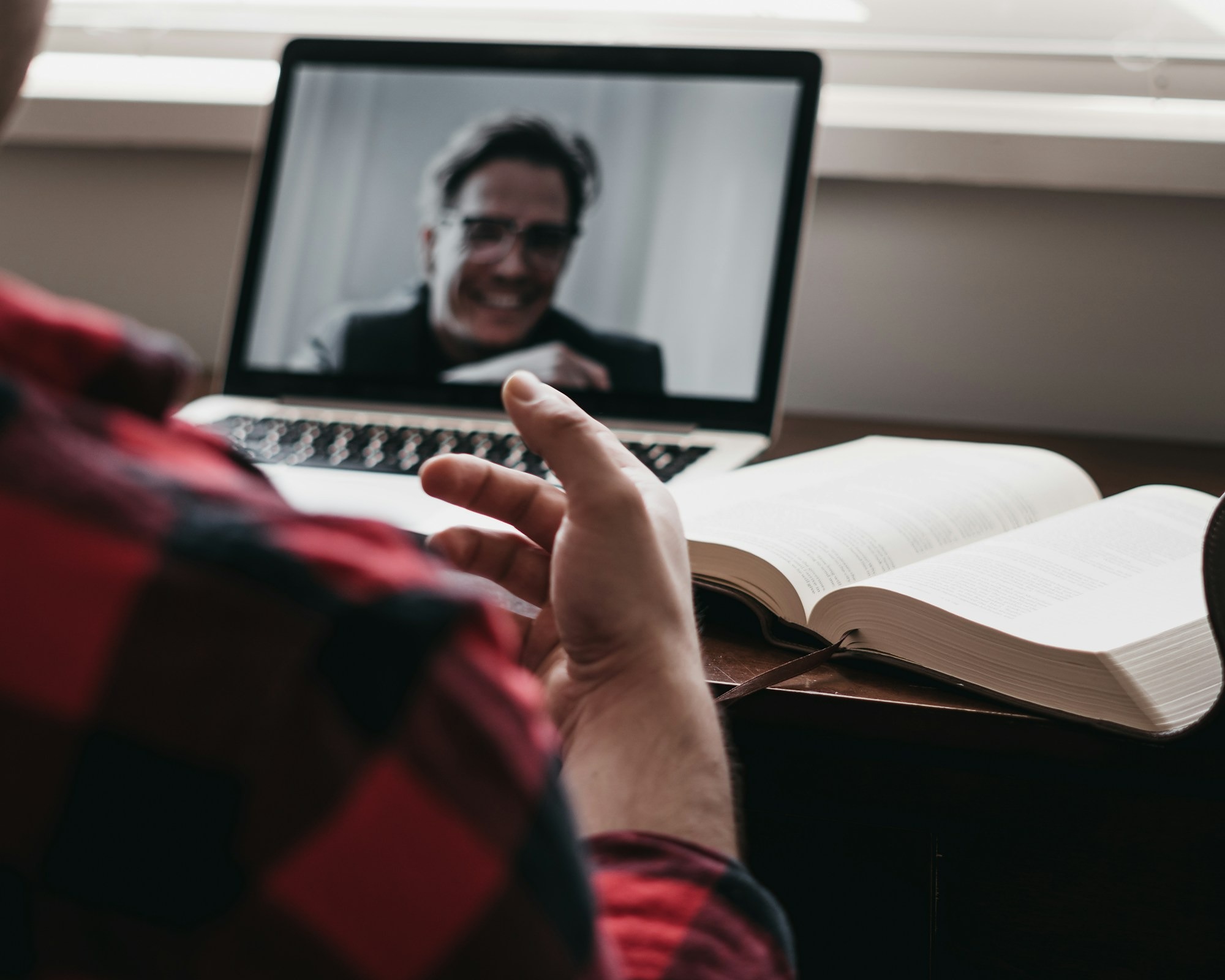 person-in-red-and-black-plaid-long-sleeve-shirt-using-black-laptop-computer-HJmxky8Fvmo.jpg