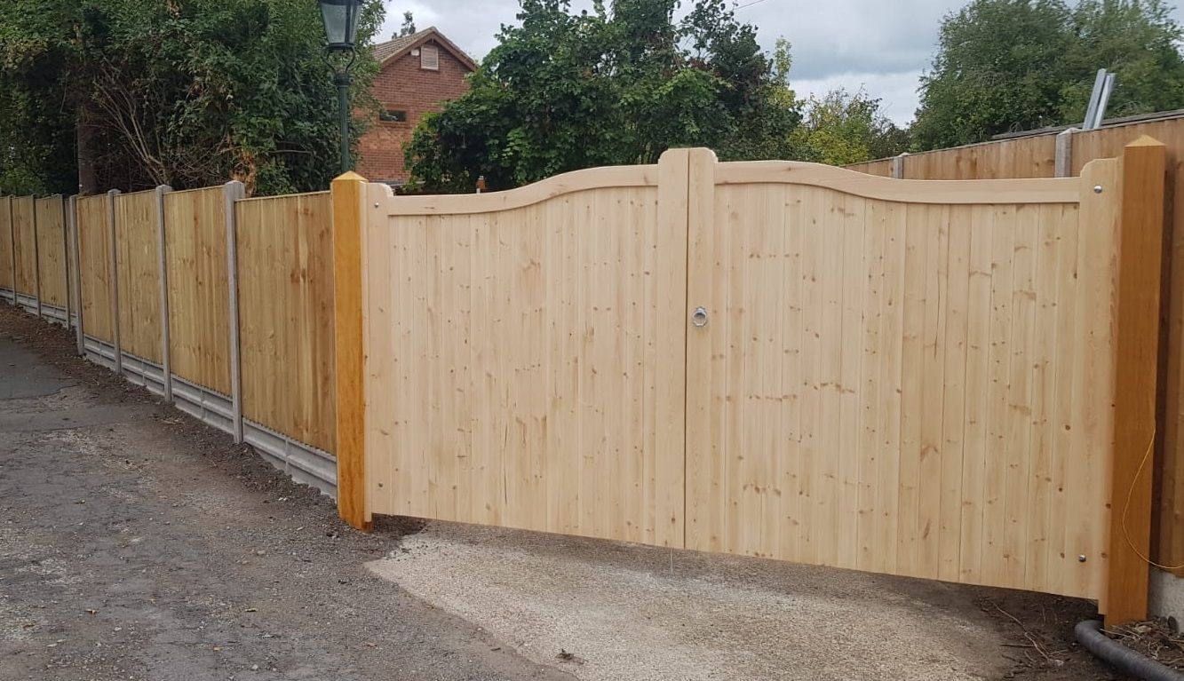 Joinery Quality bow top gates and closeboard fence.jpg
