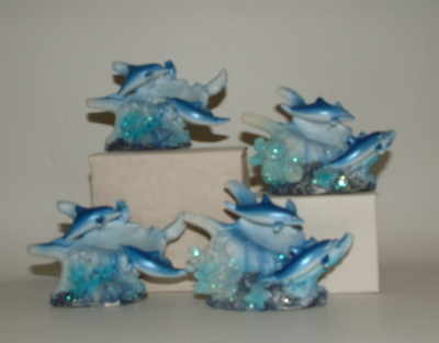 double dolphin with conchie shell