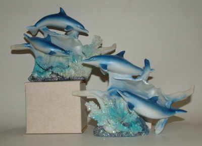 double dolphin with conchie shell