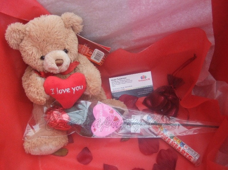 inside balloon in a box with i love you bear