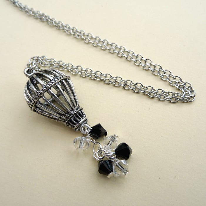 Hot air balloon necklace in silver with black and clear beads on chain, steampunk style SN117