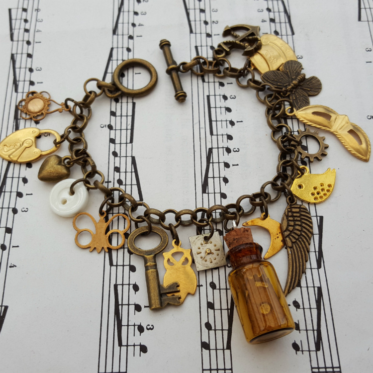 Statement assemblage vintage bronze and brass charm bracelet VCB029