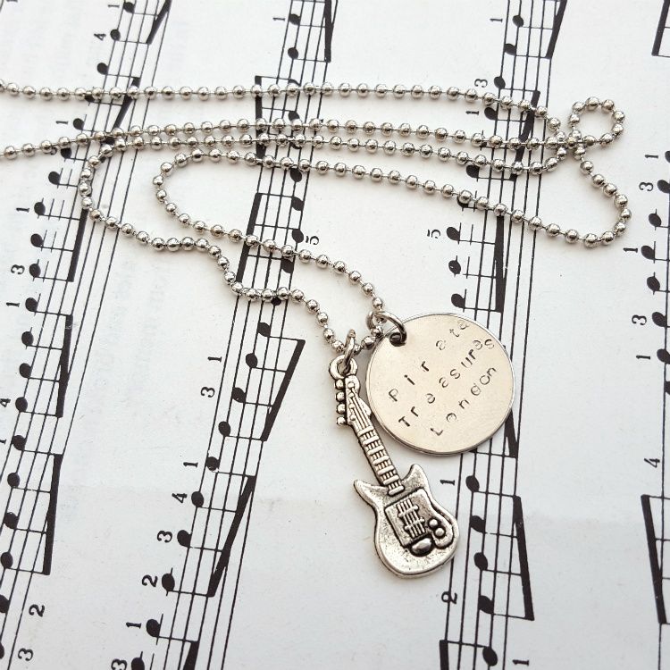 Bass guitar and Pirate Treasures disc necklace on ball chain MN030