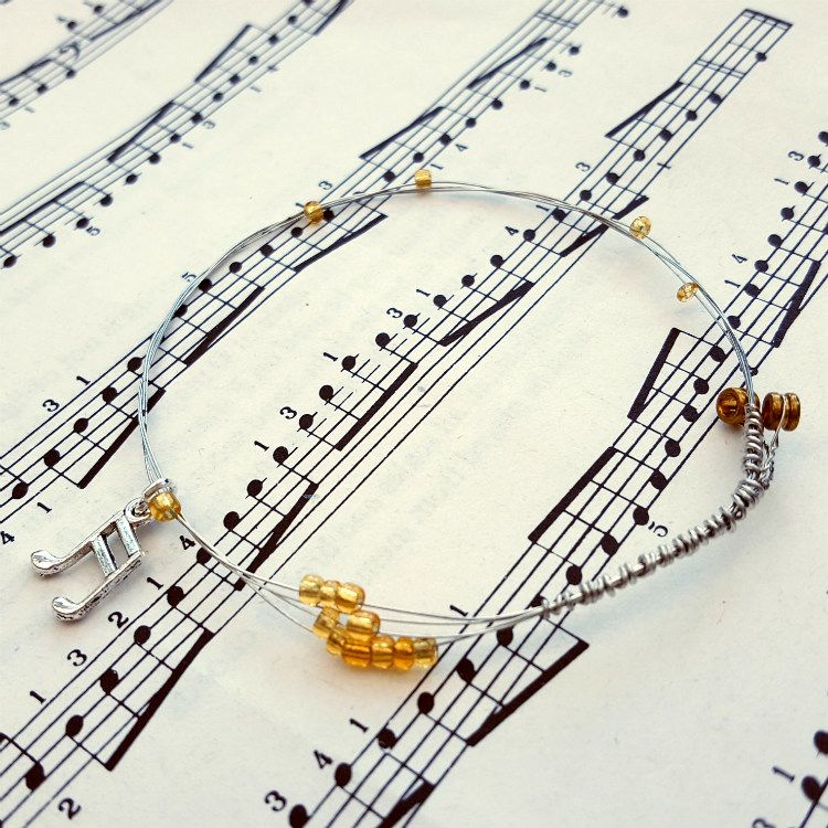 Guitar string bracelet with gold beads & music note charm (22cm circumference) GSB008