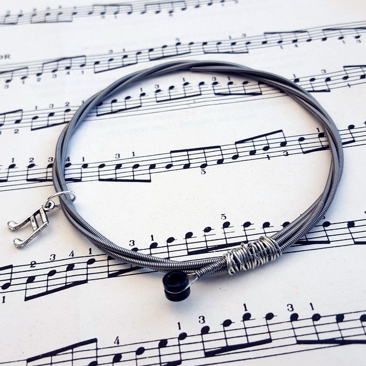 Bass guitar string bracelet with music note charm (25cm circumference) GSB012