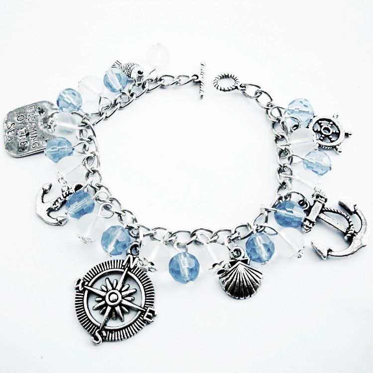 Nautical pirate charm bracelet, blue beads and silver charms PCB113