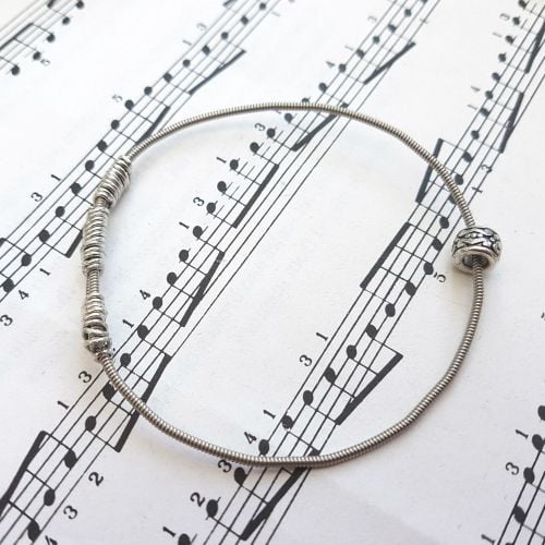 Wayne Thomas Trampolene bass guitar string bracelet size XXS (60mm diameter