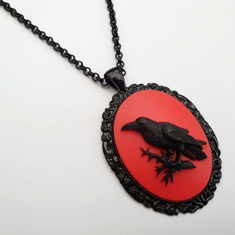 Large crow or raven cameo necklace in red and black on black chain
