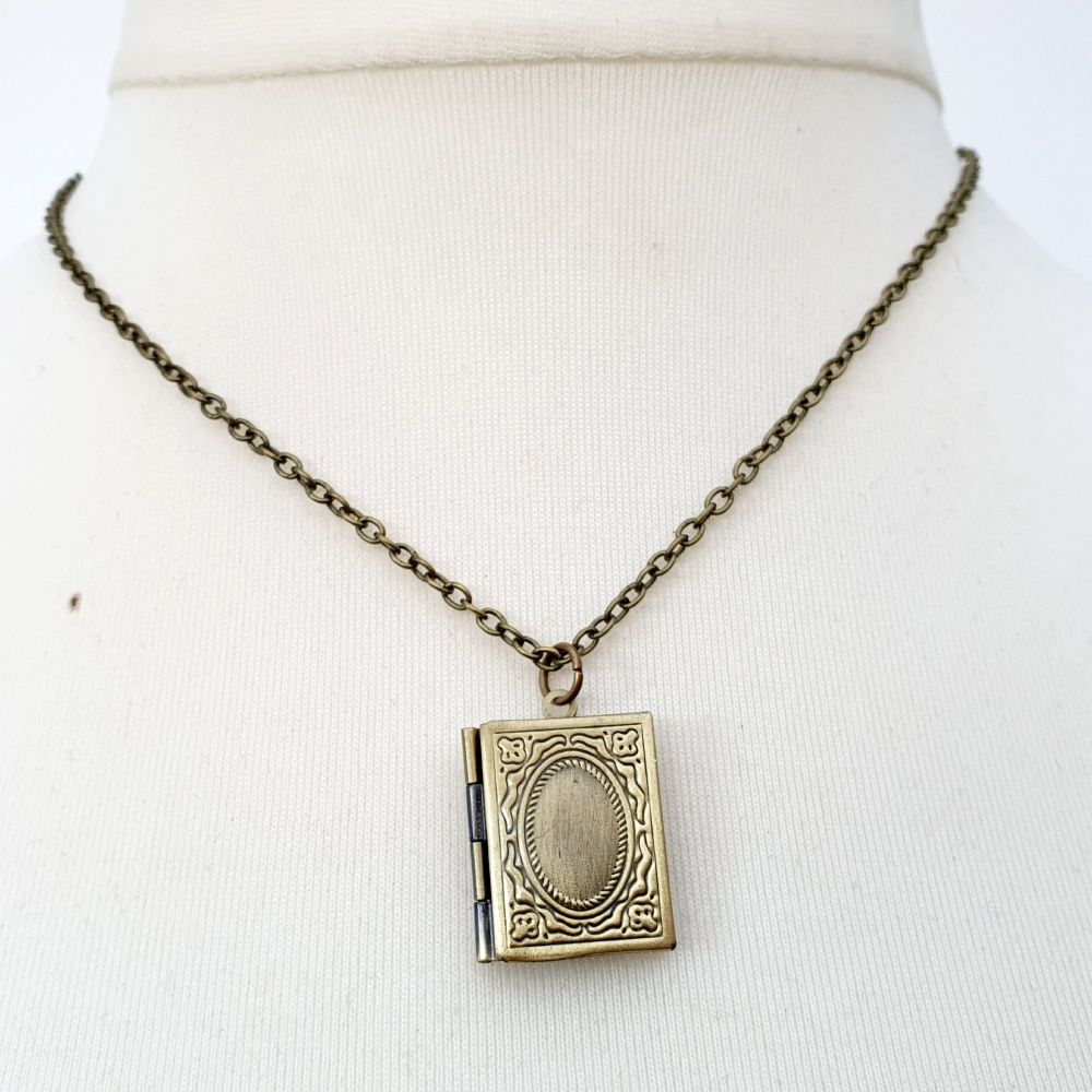 Antique bronze book locket with personalised message
