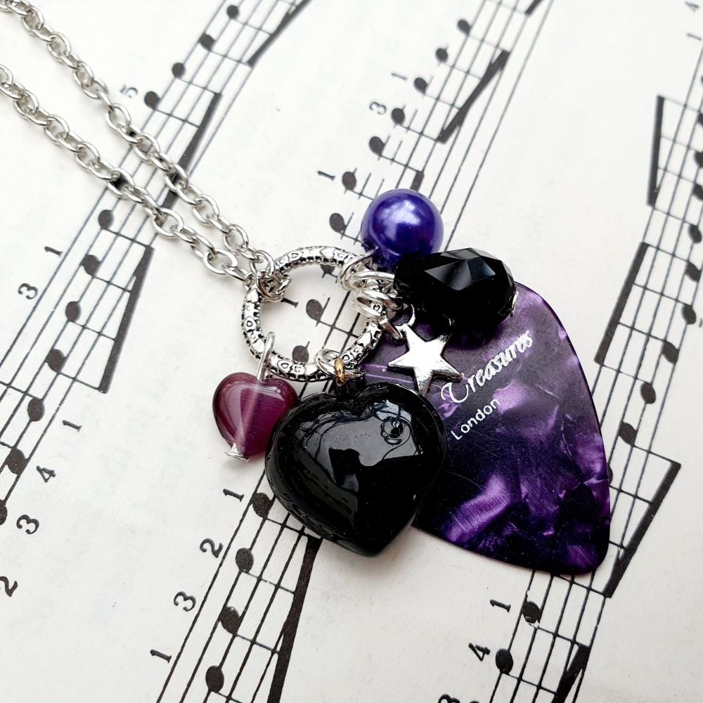Plectrum cluster charm necklace in purple and black on chain