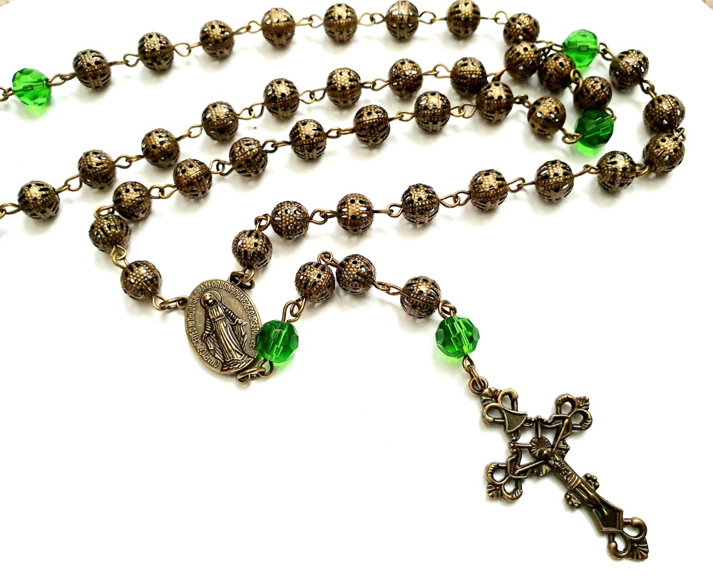 Rosary beaded necklace in antique bronze with green glass beads and large bronze crucifix VN138