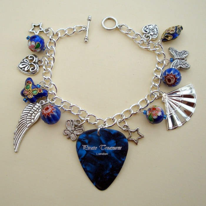 Blue plectrum charm bracelet, with silver charms and blue beads CCB029
