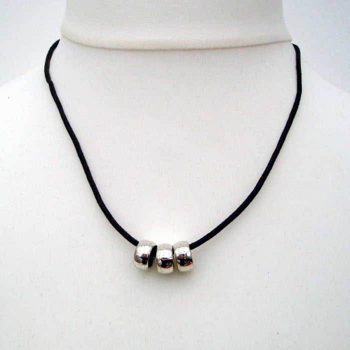 MN001 3 silver rings on brown cord men's necklace