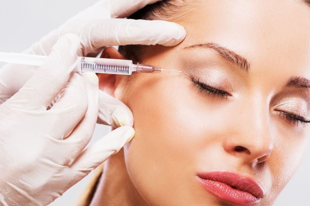 Woman-with-her-eyes-closed-receiving-Botox-injection.-468546616_2125x1416