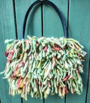 ARORA : Doogle bag, larger size, fully lined with pockets.  Placket and magnetic clasp fasteners. Will comfortably fit over your shoulder