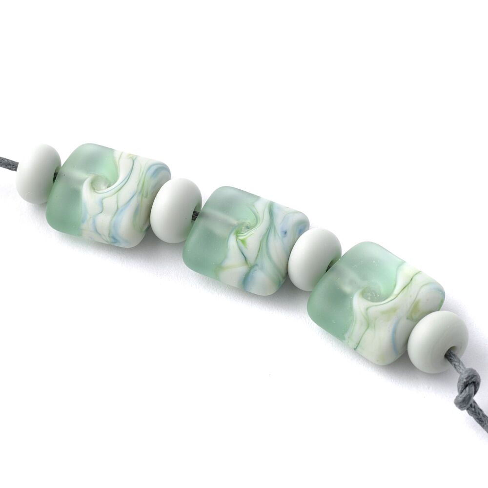 Soft Green Lampwork Glass Pressed Beads