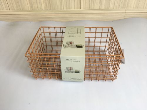 SET OF THREE TERRACOTTA WIRE BASKETS
