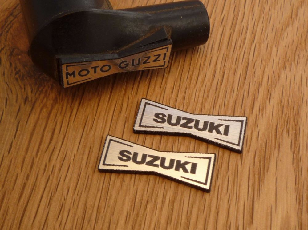 Suzuki Champion Spark Plug HT Cap Cover Badges. 29mm Pair.