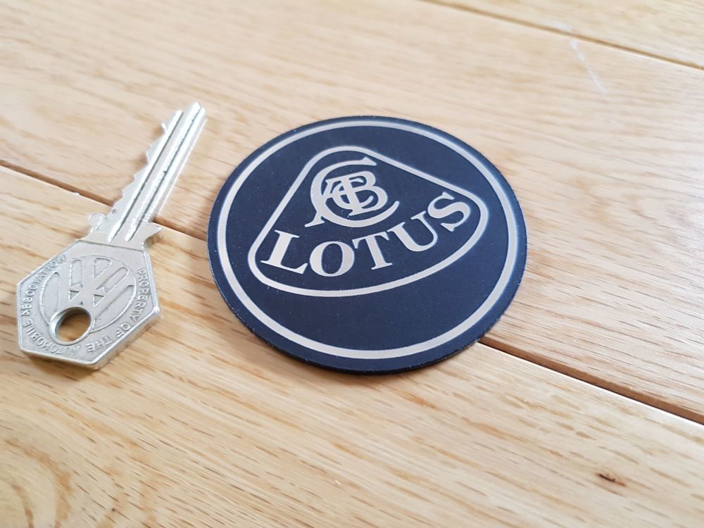 Lotus Silver on Black Round Self Adhesive Car Badge. 60mm.