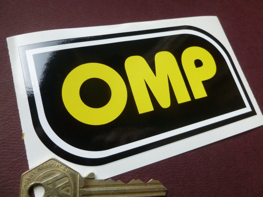 OMP  Black, White and Yellow shaped Sticker. 125mm.